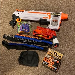 NWOT nerf gun set with bullets and accessories